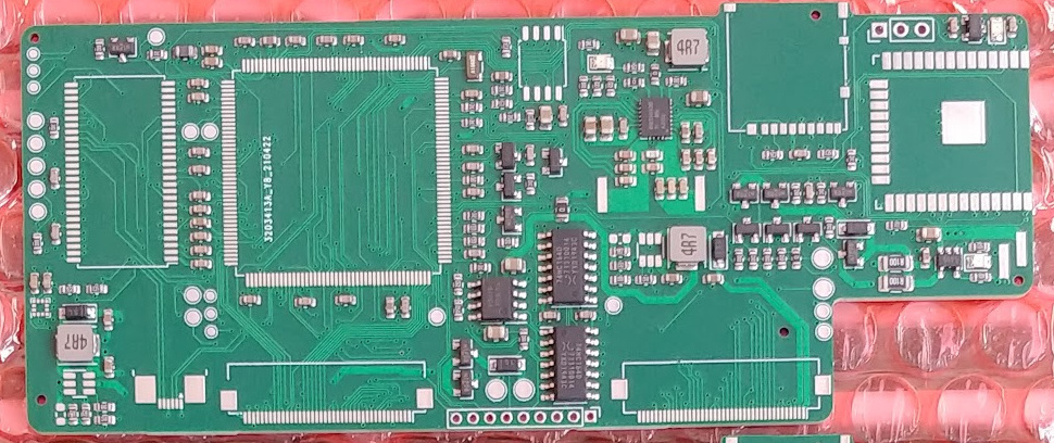 The factory-assembled board with some key components still missing