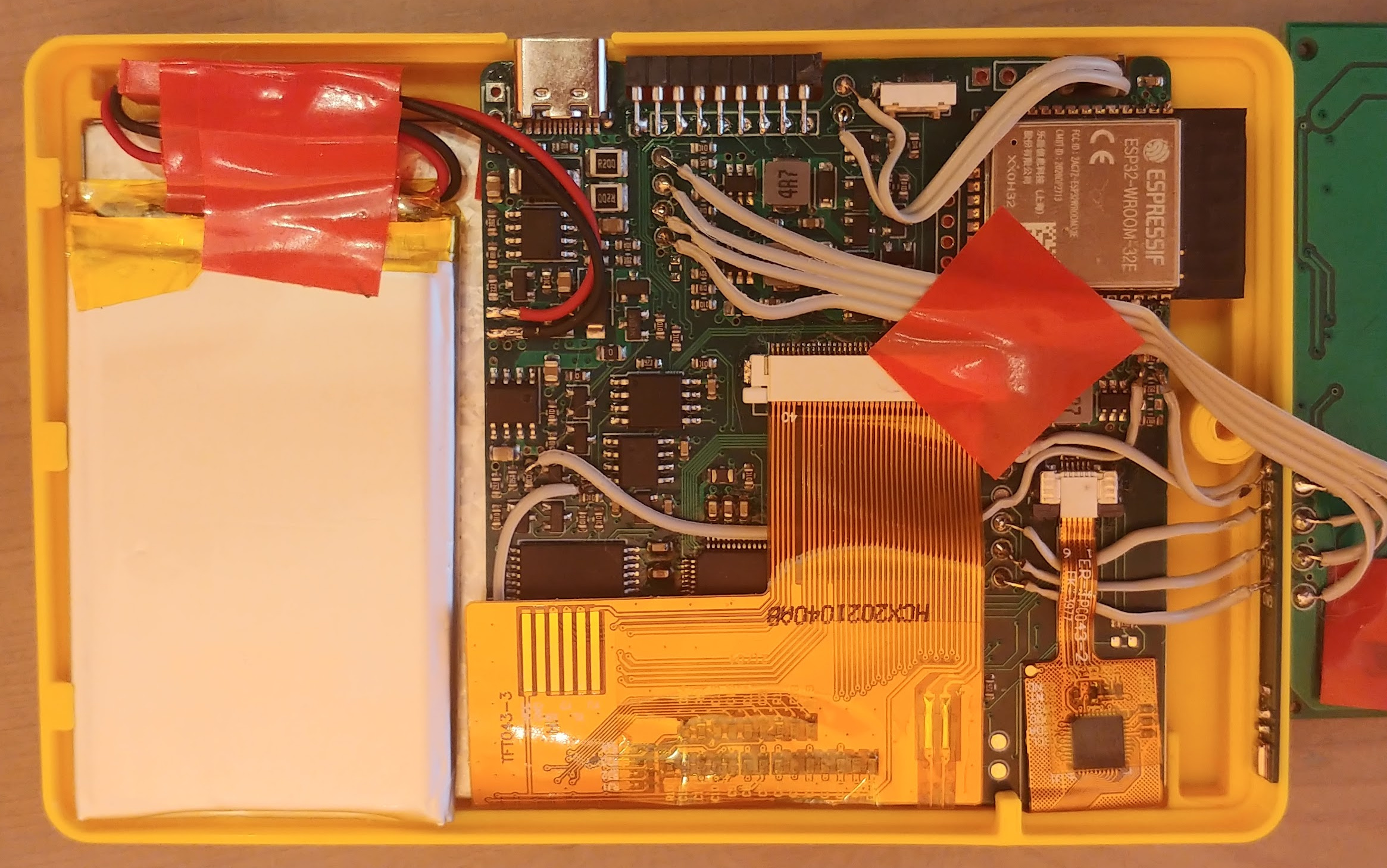 The second prototype opened up: board, display and battery in the enclosure